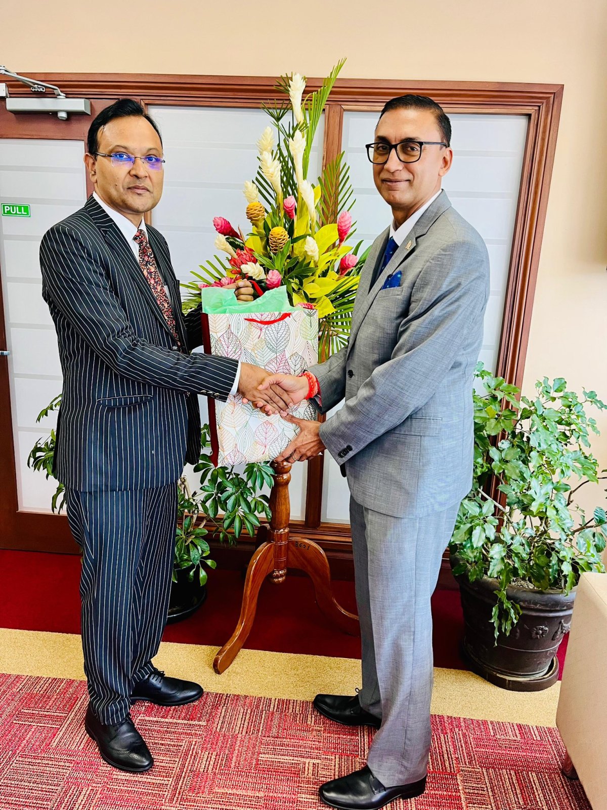 High Commissioner Dr Pradeep Rajpurohit and Honourable Ravi Ratiram, Minister of Agriculture, Land & Fisheries of Trinidad & Tobago and the team of the Ministry at their headquarters