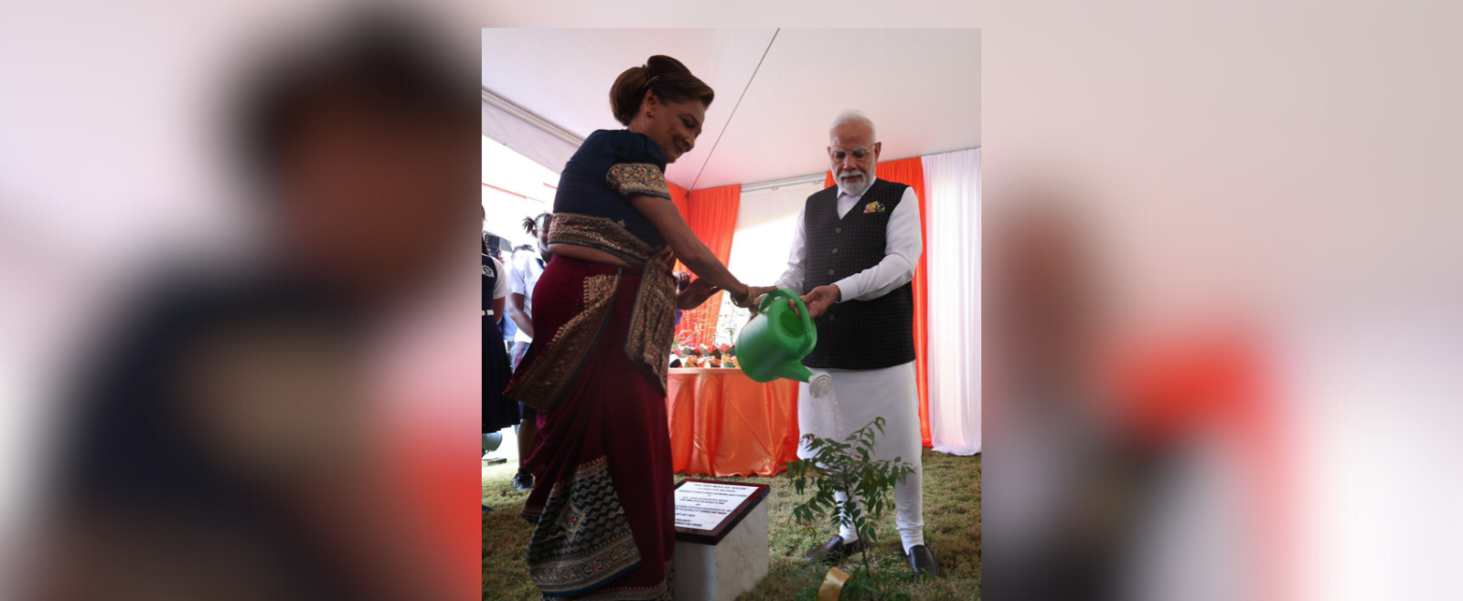 The Honourable Shri Narendra Modi, Prime Minister of India, and the Honourable Kamla Persad-Bissessar, Prime Minister of the Republic of Trinidad and Tobago, planting a tree in honour of the 'Ek Ped Maa Ke Naam' initiative