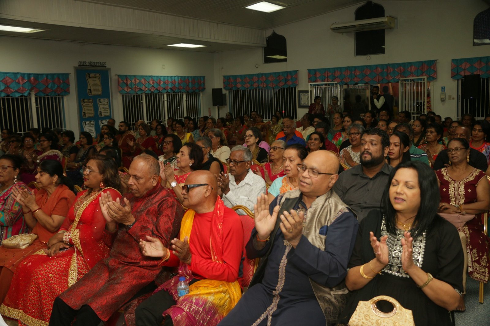 Brij Lok Manch Dance Group performing at the Spring Village Mandir, Couva on the occasion of Indian Arrival Day